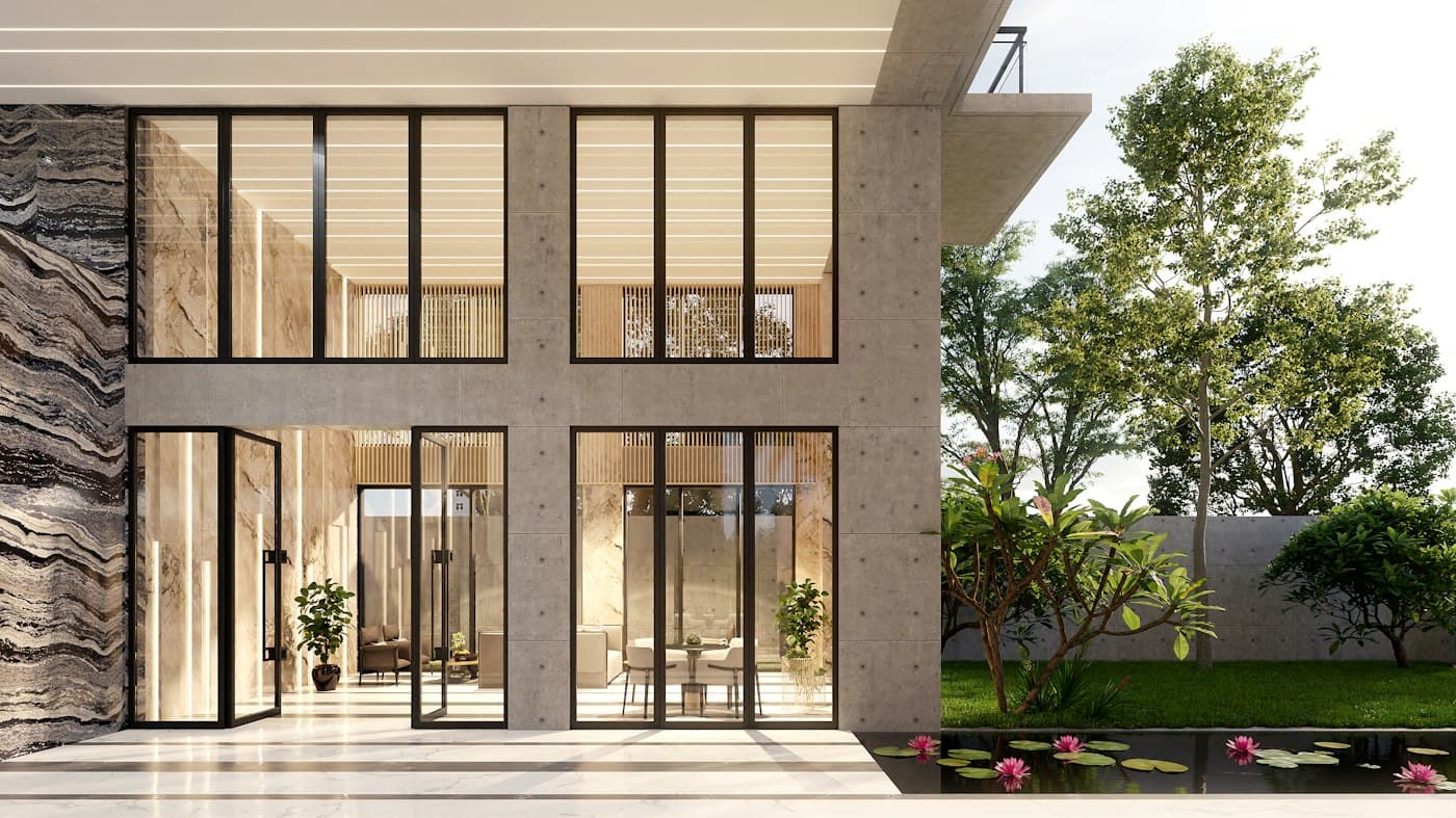 Modern residence with glass walls and a landscaped garden with a water feature